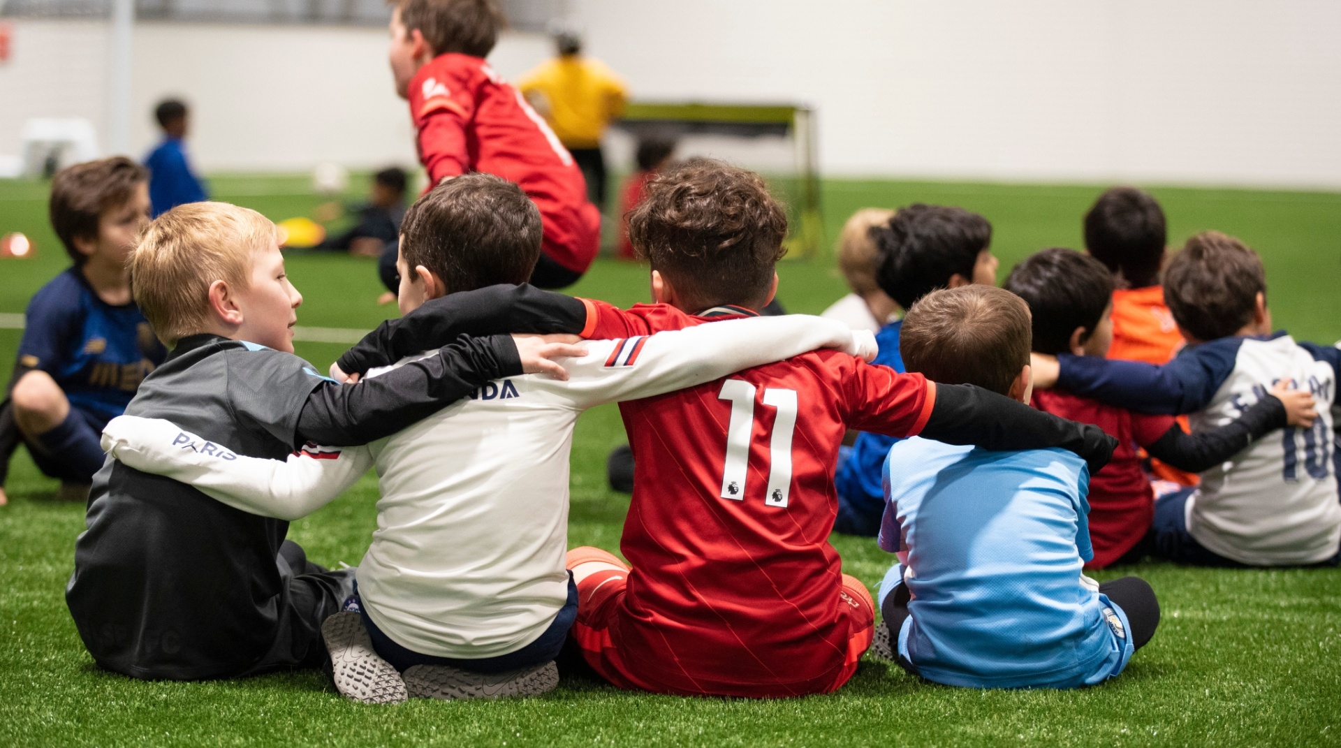 Young footballers celebrating together